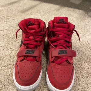 Nike Red High-Top Sneakers with Black Logo